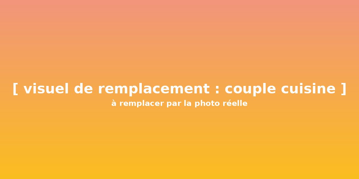 Un couple heureux dans leur cuisine